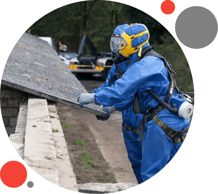 6812 A person in blue suit and yellow helmet holding a piece of wood.